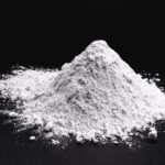 Image of white fumed silica on black background, lubricants, additives