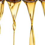greasy yellow substance dripping down, lubricant additives, corrosion inhibitors, tackifiers, viscosity modifiers